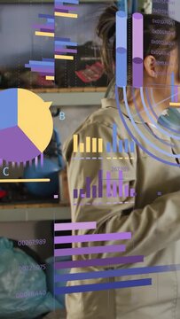 Vertical video: Data overlays popping up, woman turning head and shifting in shop, reviewing charts