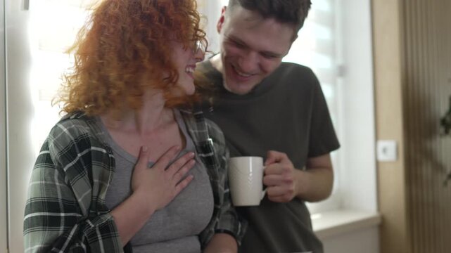 Overjoyed couple receiving good news in a letter
