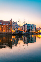 Gdansk with Motlawa river in Poland. Old town colourful house with Stragania Gate © Zedspider