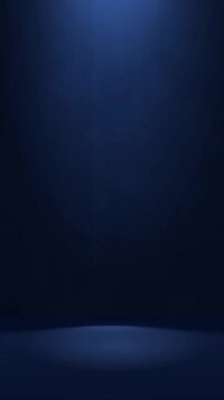 The studio background is dark blue with smoky light.