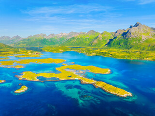 Aerial drone view of a scenic landscape in Lofoten islands, Norway. Norwegian arctic landscape with mountains, fjord and ocean. Travel and vacation in Scandinavia nature. © biletskiyevgeniy