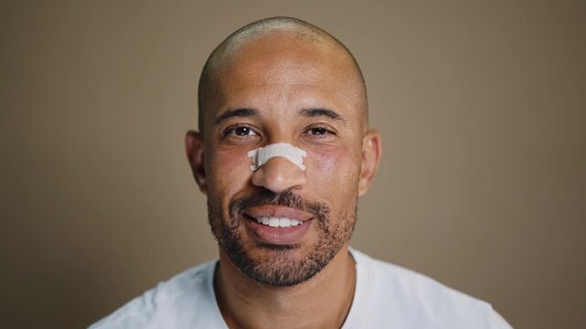 Beauty portrait of middle-aged hispanic black handsome man on colored background, concepts about beauty treatment, skincare and cosmetics for men	