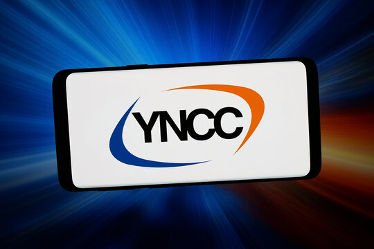 Stuttgart, Germany - 04-13-2026: In this photo illustration, the logo of Korean company Yeochun NCC Co. Ltd. (YNCC) is displayed on a smartphone in front of abstract background on computer screen.