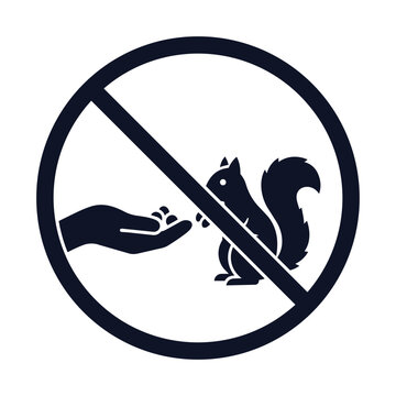 A black and white sign with a line through it showing a hand and a squirrel.
