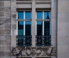 Fototapeta premium Classical window and stone ornament on the façade of the Staatsbibliothek Unter den Linden in Berlin