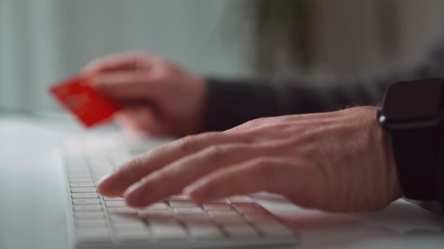 Online Shopping with Credit Card at Home Close Up Payment and Keyboard Lifestyle Scene