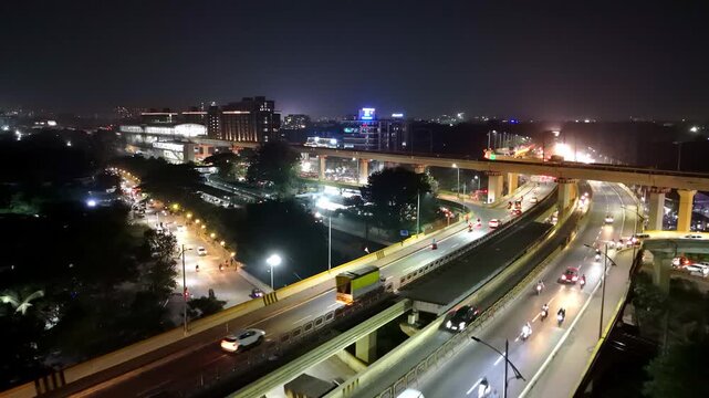 Modern Highway Interchange with City Lights at Night