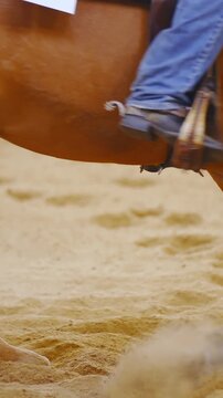 Horse spin like crazy inside riding arena in slow motion long shot
