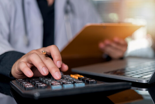 Healthcare provider working calculator financial document administration clinic accounting medical coding billing software smart modern healthcare economy.