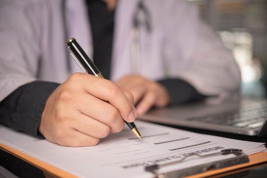 Healthcare provider writing prescription signing agreement insurance policy document modern clinic smart hospital finance workflow official medical authorization.