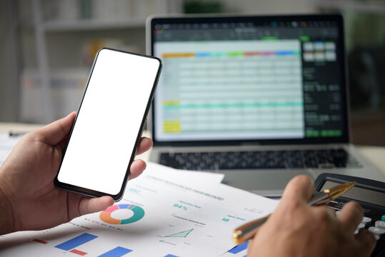 Financial working with  charts laptop and smartphone mockup. Data driven decision making  business growth. Professional accounting workspace digital marketing analytics .