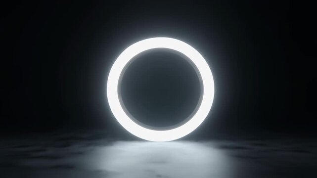 Glowing white ring light on dark.