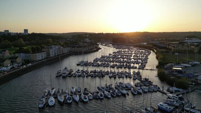 4K Aerial Slide Shot at Penarth Marina, River Ely, Cardiff, Wales During Sunset
