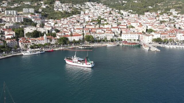 Makarska, Croatia. Coastal town, sea and mountains, Aerial photography from a drone. Croatian town on the Adriatic Sea. Makarska Riviera