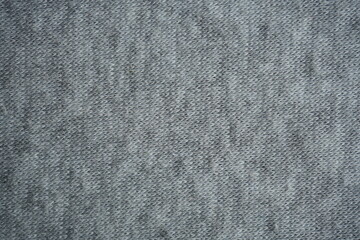 grey fleece fabric texture, macro texture fleece gray fabric photo above as background macro texture of grey fleece fabric. Close-up of soft synthetic textile surface with fine fibers and smooth fluf  © Анна Климчук