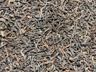 Fototapeta premium Full frame close-up of dried black tea leaves