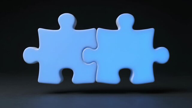 Two Blue Puzzle Pieces Connecting Together Symbolizing Partnership and Solutions.