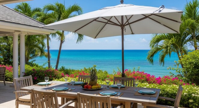 A serene outdoor dining setting by the ocean.