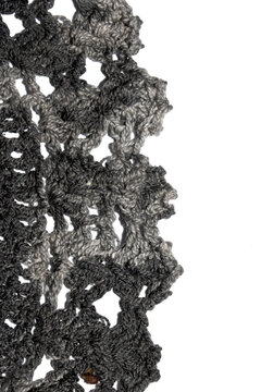 Close up of vintage black gothic lace fabric white on black background embroidery