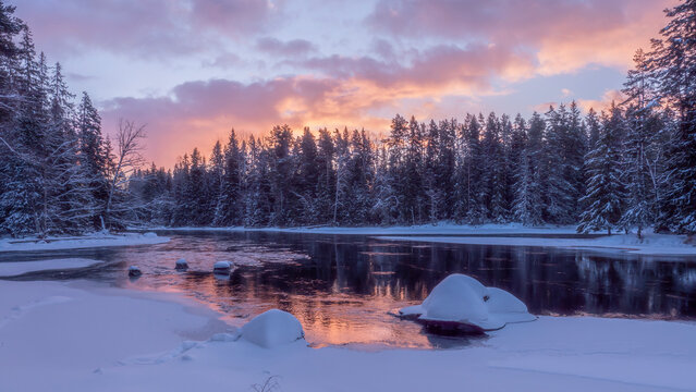 Swedish river and natural saalmon area in winter Farnebofjarden natinal park in north of Sweden.