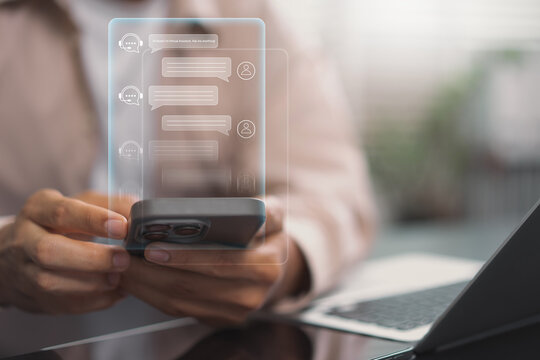 AI chatbot customer support and virtual assistant service concept. Person using smartphone for instant messaging and automated digital help desk interaction to enhance online user experience.