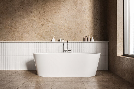 Minimalist bathroom with freestanding tub, clean modern style on warm stone background, concept of calm interior design, 3D Rendering