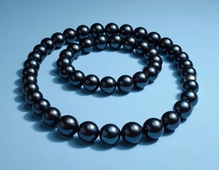 Obraz premium Luxury black pearl necklace arranged in a double circle