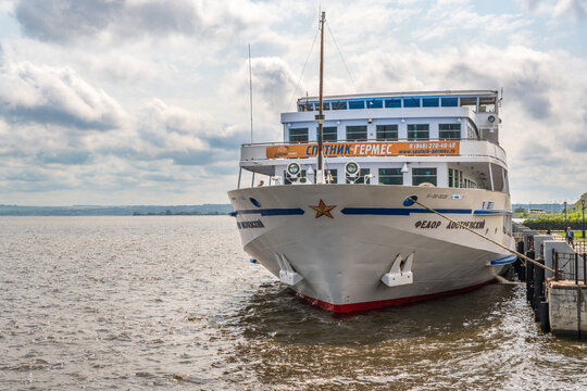 Kazan, Russia - June 14, 2025: River landscape. Large river cruise ship on the Volga river