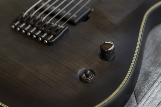 7-String Electric Guitar Schecter KM-7 Keith Merrow Signature Model on desk 