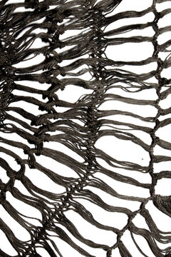 Close up of vintage black gothic lace fabric white on black background embroidery