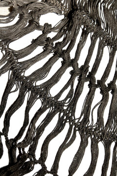 Close up of vintage black gothic lace fabric white on black background embroidery
