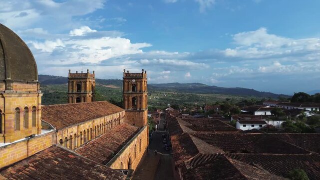 Aerial view of the Immaculate Conception Cathedral and colonial rooftops of Barichara at sunset, Colombia
