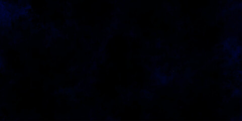 Naklejka premium Blue smoke in dark background. Texture and desktop picture. A stunning nocturnal skyscape with a dramatic storm approaching. Blue Mist Texture for Fantasy or Atmospheric Visual technical.