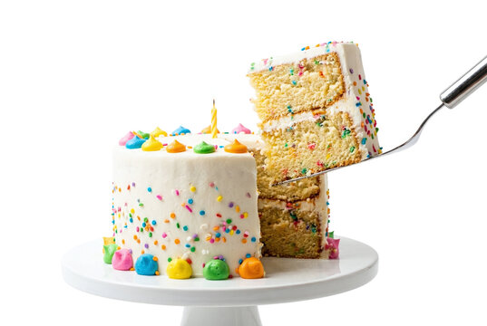 Slice of birthday cake with colorful sprinkles and frosting