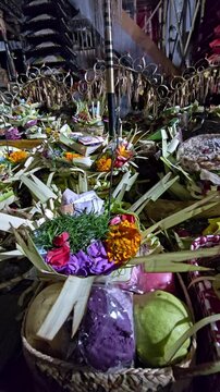 Traditional Balinese Canang Sari Offerings with Flowers and Fruit for Hindu Ritual