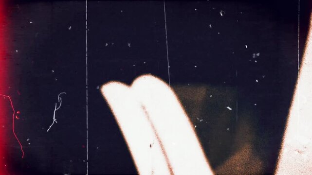 Grunge texture overlay background, punch hole, cine marks, dust and scratches, old film reel. High quality 4k footage	