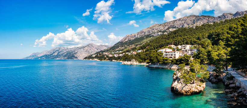 Kamen Brela symbol of the city of Brela on Adriatic coast of Dalmatia, Croatia. Kamen Brela, tiny famous island in Brela, Makarska Riviera, Dalmatia, Croatia.