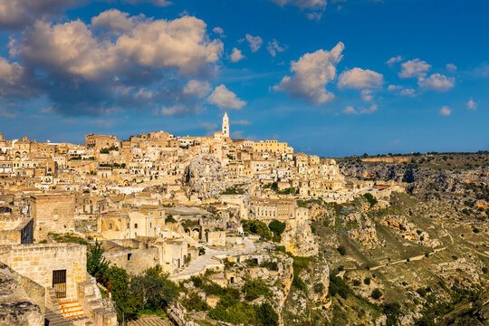 Panoramic view of the ancient town of Matera (Sassi di Matera) in a beautiful autumn day, Basilicata, southern Italy. Stunning view of the village of Matera. Matera is a city on a rocky outcrop.