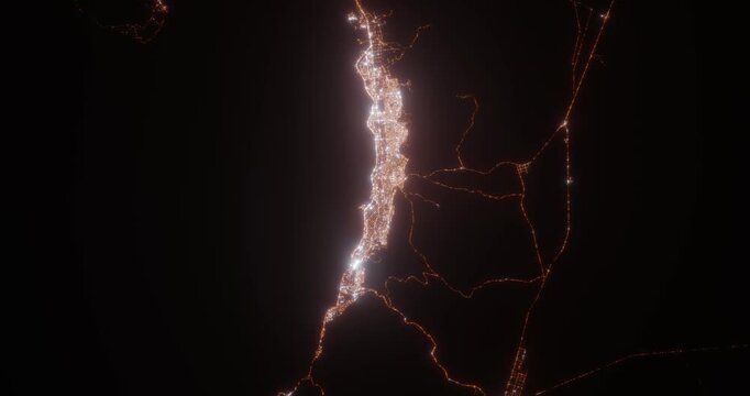 Antofagasta (Chile) aerial view at night. View on modern city from space. Camera is zooming in, rotating counterclockwise