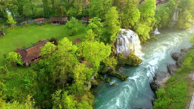 Village of Rastoke near Slunj in Croatia, old water mills on waterfalls of Korana river, beautiful countryside landscape. Landscape with river and little waterfalls in Rastoke village, Croatia.