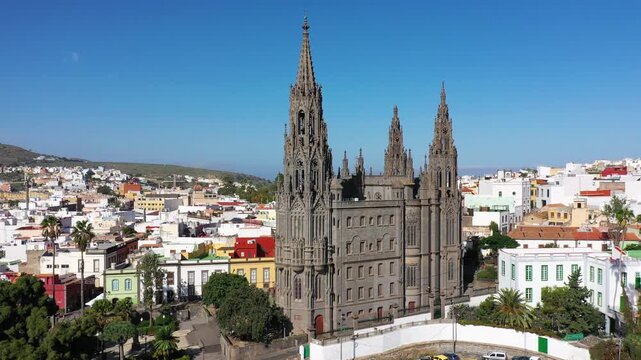 Aerial view of the Parroquia de San Juan Bautista de Arucas church in Arucas town, Gran Canaria, Canary Islands, Spain. Historic Neo-Gothic cathedral in Arucas.