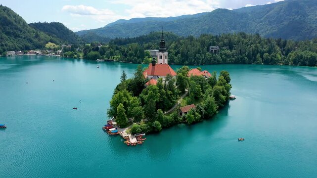 Lake Bled in Slovenia. Beautiful mountains and Bled lake with small Pilgrimage Church. Bled lake and island with Pilgrimage Church of the Assumption of Maria. Bled, Slovenia, Europe.