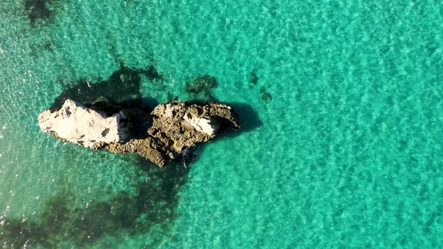 Aerial view of Baia dei Turchi, Puglia region, Italy. Turkish Bay (or Baia dei Turchi), this coast of Apulia is one of the most important ecosystems in Salento, Italy. Seacoast of Baia dei Turchi.