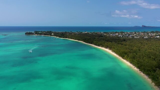 Mauritius beach aerial view of Mont Choisy beach in Grand Baie, Pereybere North. Mont Choisy, public beach in Mauritius island, Africa. Beautiful beach of Mont Choisy in Mauritius, drone aerial view.