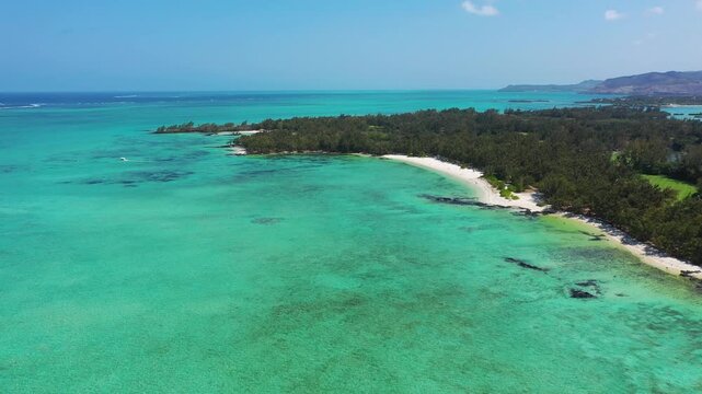 Ile aux Cerfs island with idyllic beach scene, aquamarine sea and soft sand, Ile aux Cerfs, Mauritius, Indian Ocean, Africa. Ile aux Cerf in Mauritius, beautiful water and breathtaking landscape.