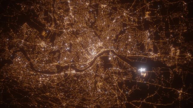 Springfield (Massachusetts, USA) aerial view at night. Top view on modern city with street lights. Camera is zooming out, rotating clockwise. Vertical video. The north is on the left side