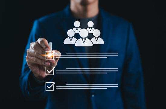 Human resources management concept. Businessman marking digital checklist for talent selection. recruitment, employee evaluation, screening, candidate, leadership, professional hiring process, HR