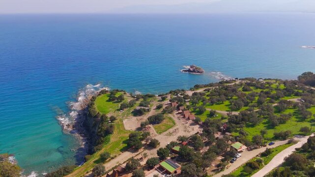 Aerial Drone Shot of Cyprus Campsite and Rugged Volcanic Rock Formations along Akamas Coast