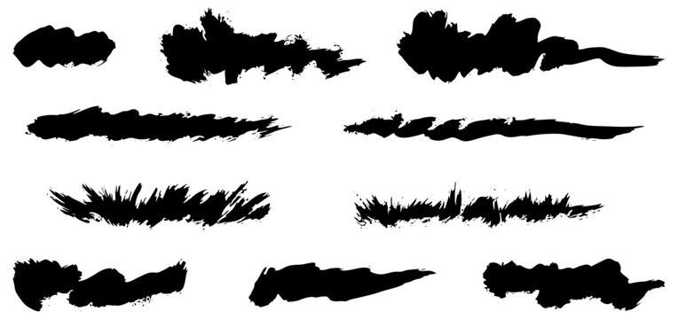 Expressive black ink swatches created with small flat bristle brush. Manual handdrawn paint blots and textured smudges. Unique analog artistic shapes on paper