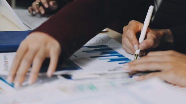 Anonymous hands of an accountant working with documents